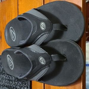 Black Reef thong flip flops